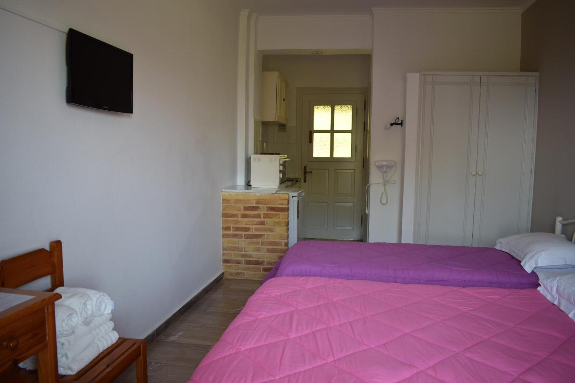 Rising Sun Apartments & Studios Бенитсес Номер фото